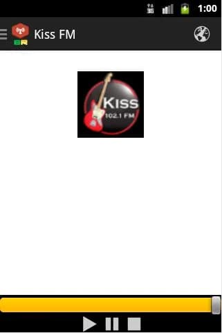 App Kiss FM no Android legado com logo Kiss 102.1 FM, barra amarela de volume e controles play pause stop